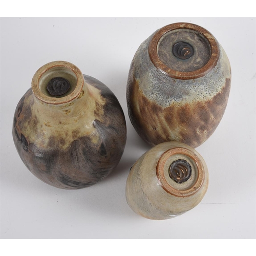 157 - Chris Carter (b.1945), A group of three studio pottery stoneware vases with a mottled glaze, each wi... 