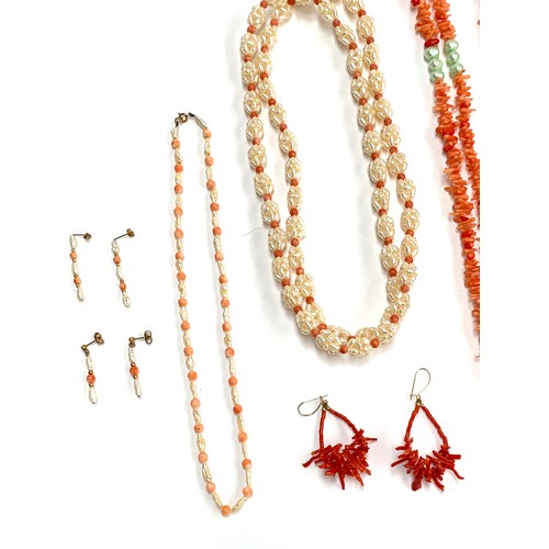 119 - A quantity of coral jewellery to include a pearl and coral bead necklace with 9ct gold clasp, with t... 