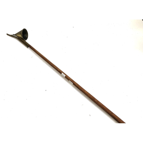 1321 - An ecclesiastical candle snuffer, 110cmL