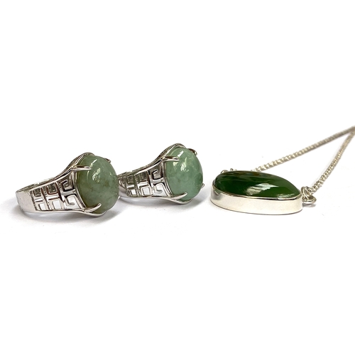 17 - Three sterling silver and nephrite jade necklaces, the Russian nephrite 22cts, the silver chains 46c... 