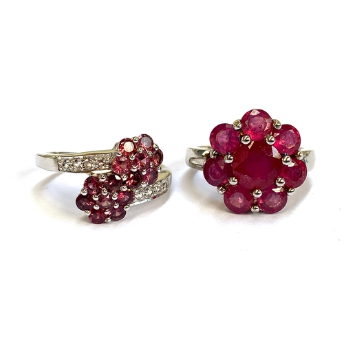 20 - A sterling silver ruby floral cluster ring, the madagascan rubies totalling 8.15cts, size R 1/2; tog... 