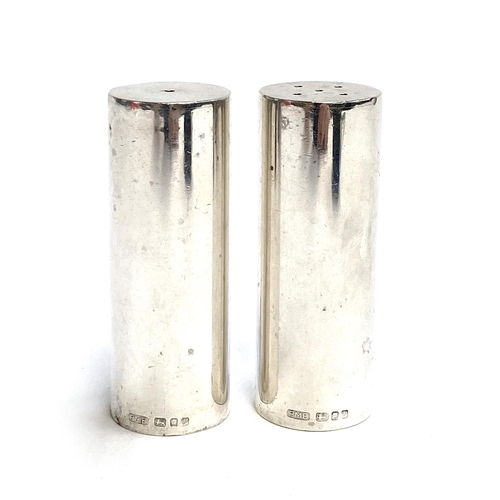 153 - A pair of smart silver cylindrical salt and peppers, hallmarked for Peter Morton Browne, London, 199... 