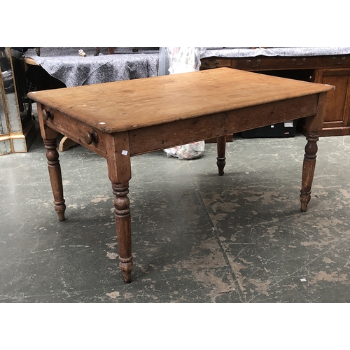 1247 - A Victorian pine farmhouse kitchen table with end drawer, on turned legs, 137x88x74cmH