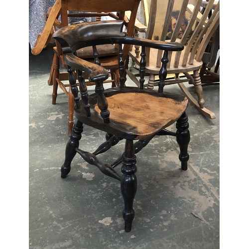 1253 - An ash and elm smokers bow armchair, on heavily turned legs and H stretcher, 63cmW