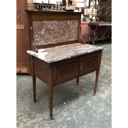 1261 - An Edwardian mahogany washstand with marble top and upstand, 92x46x77cmH (excluding upstand)