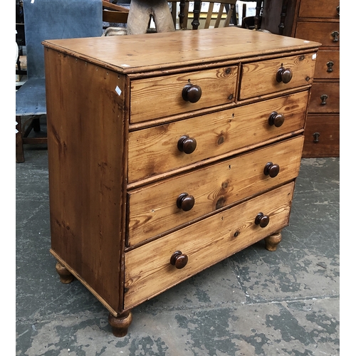 1293 - A 19th century pine chest, two short over three long drawers, with applied mouldings, on turned feet... 