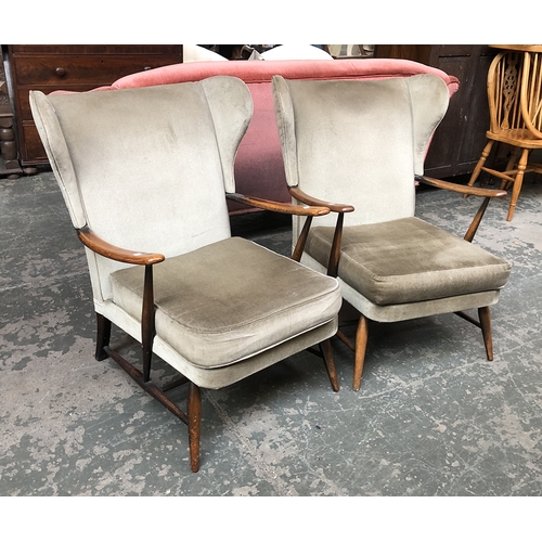 1304 - A pair of Ercol wingback armchairs