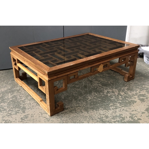 1311 - A 20th century large Chinese coffee table with smoked glass inset top, 122x86x43cmH