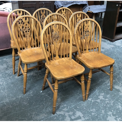 1322 - A set of eight 20th century wheelback kitchen chairs