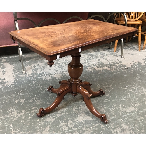 1341 - A Victorian centre table on turned column and four carved scrolling legs, 82x50x68cm