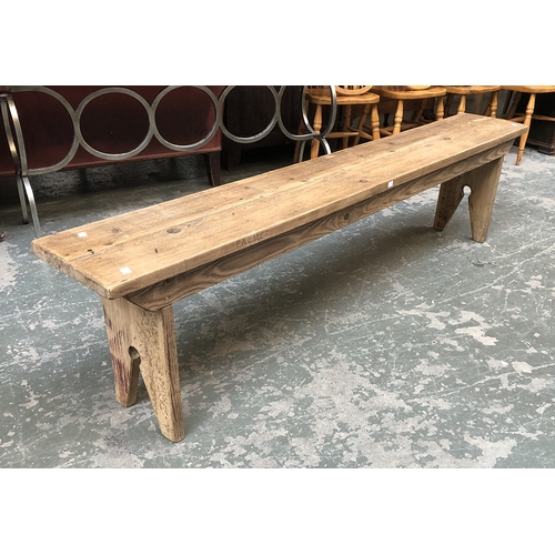 1346 - A pine bench on trestle supports, 200x30x49cmH