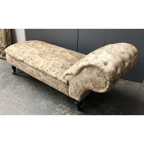 1371 - A Victorian button back chaise longue, on ebonised turned legs, 185cmL