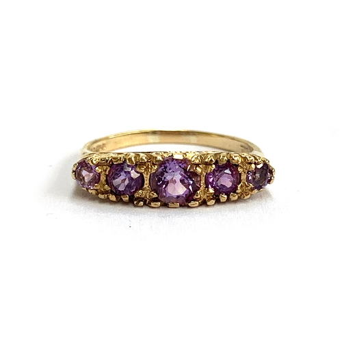 113 - A 9ct gold and amethyst five stone ring, size P, 2.8g