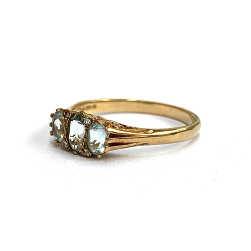 114 - A 9ct gold, aquamarine and diamond ring, size O, 1.8g