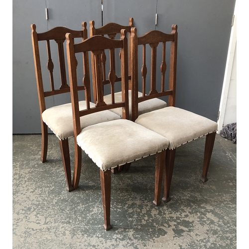 1339 - A set of four oak dining chairs with stuffover seats