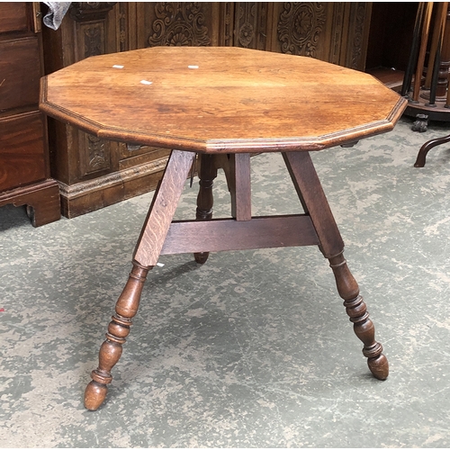 1349 - An early 20th century Dutch Maison Drouot Wesser & Co. Den Haag twelve sided oak folding table on ca... 