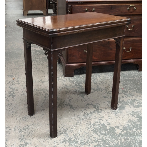 1353 - A mahogany card table in George III style, 69cmW; together with a nest of three tables with leather ... 