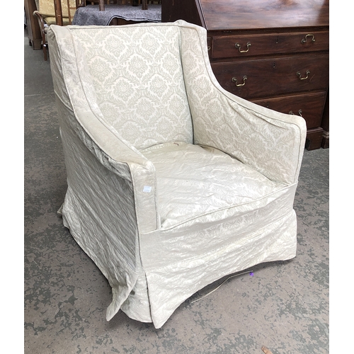 1373 - A small country house armchair (af), 74cmW; together with a further early 20th century armchair on s... 