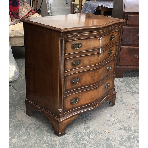 1378 - A 20th century serpentine chest of four drawers on bracket feet, 72x50x80cmH