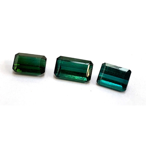 92 - Three loose emerald cut tourmaline stones, totalling approx. 11.3cts