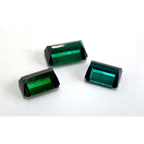 92 - Three loose emerald cut tourmaline stones, totalling approx. 11.3cts