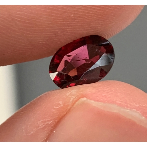 98 - A pink rubellite tourmaline, approx. 2cts, 10x7mm; together with a yellow tourmaline, approx. 2.5cts... 