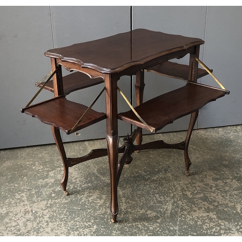 1268 - An Edwardian mahogany shaped occasional table, each slide with drop mechanism, 61cmW