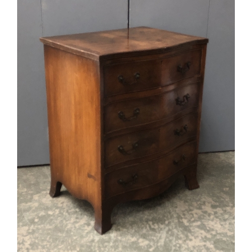 1318 - A small serpentine chest of four drawers, 61x45x76cm