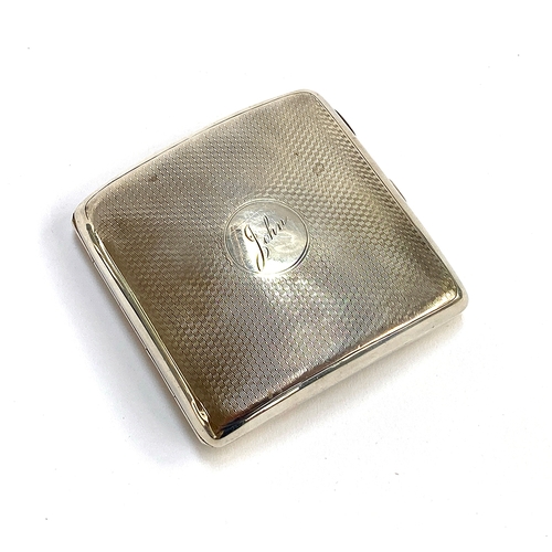 146 - An engine turned silver cigarette case by A & J Zimmerman Ltd, Birmingham 1925, with silver gilt int... 