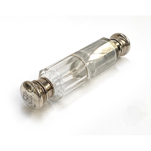 150 - A white metal and cut glass double ended scent bottle, 14.7cm long