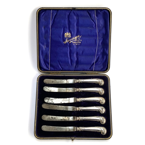 151 - A cased set of six silver handled butter knives, with stainless steel blades