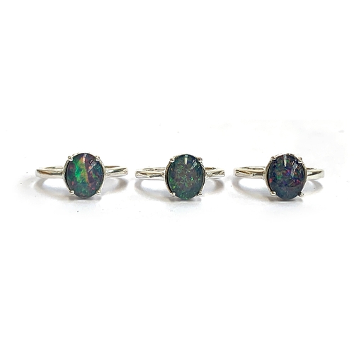 126 - Three 925 silver and opal doublet rings, approx. size P