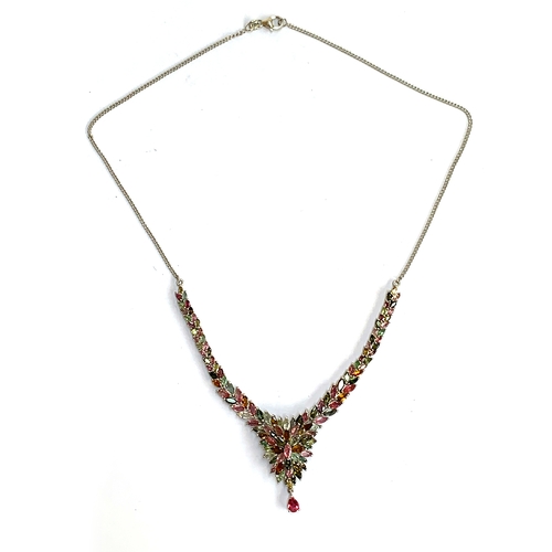 127 - A 925 silver necklace set with a cluster of marquise cut tourmalines, the multi coloured tourmalines... 