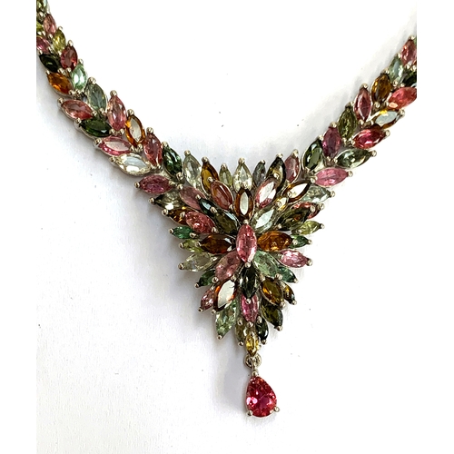 127 - A 925 silver necklace set with a cluster of marquise cut tourmalines, the multi coloured tourmalines... 