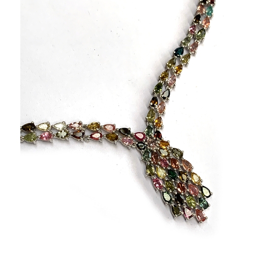 128 - A 925 silver necklace set with pear cut tourmalines, the multicoloured tourmalines totalling 18.69ct... 