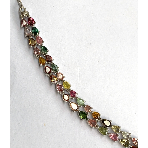 128 - A 925 silver necklace set with pear cut tourmalines, the multicoloured tourmalines totalling 18.69ct... 