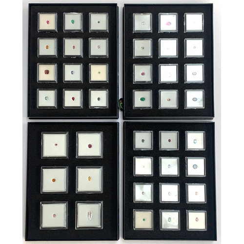 136 - Four 'Gem Collector' specimen display trays containing a variety of gems, including sapphires, garne... 