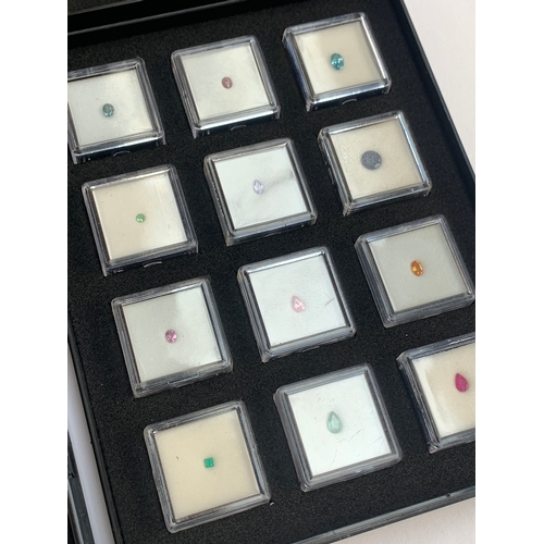 136 - Four 'Gem Collector' specimen display trays containing a variety of gems, including sapphires, garne... 