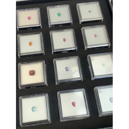 136 - Four 'Gem Collector' specimen display trays containing a variety of gems, including sapphires, garne... 