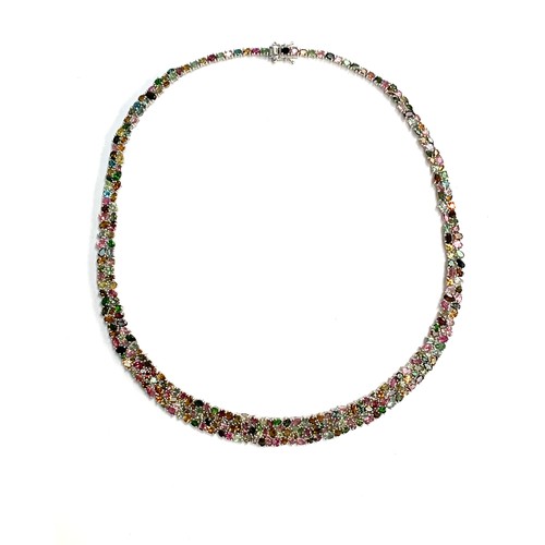 135 - An impressive 925 silver collar necklace set with 50cts of multicoloured tourmalines of varying cuts... 