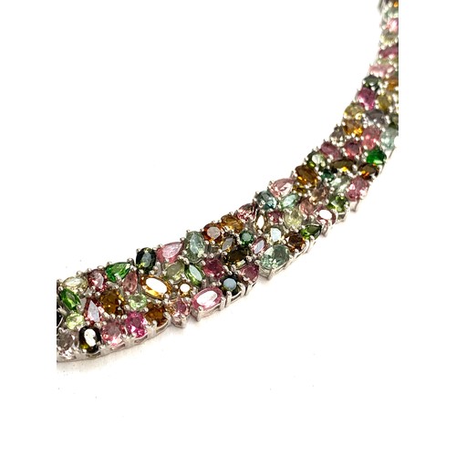 135 - An impressive 925 silver collar necklace set with 50cts of multicoloured tourmalines of varying cuts... 