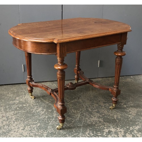 1313 - A late 19th/early 20th century shaped centre table, fluted tapering legs joined by H stretchers, 103... 