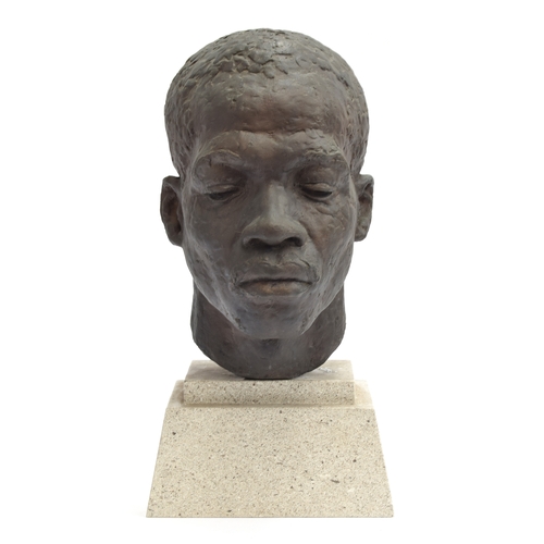 113 - Rhona Stern (South African, 1914-1998), portrait bust of a young man, on a granite plinth base, 37cm... 