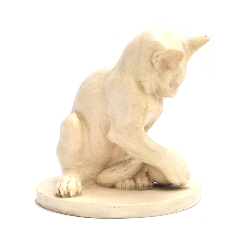 120 - Emiel Hartman (20th century), large resin sculpture of a cat playing with a ball, signed to base, 30... 