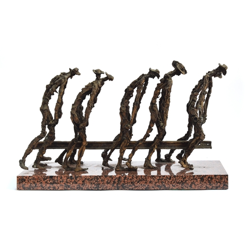 118 - A 20th century bronze abstract sculpture, workmen carrying a girder, 32cm high, the red granite plin... 