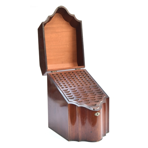 400 - A George III mahogany serpentine knife box with original fitted interior, 26cm wide, 40cm high