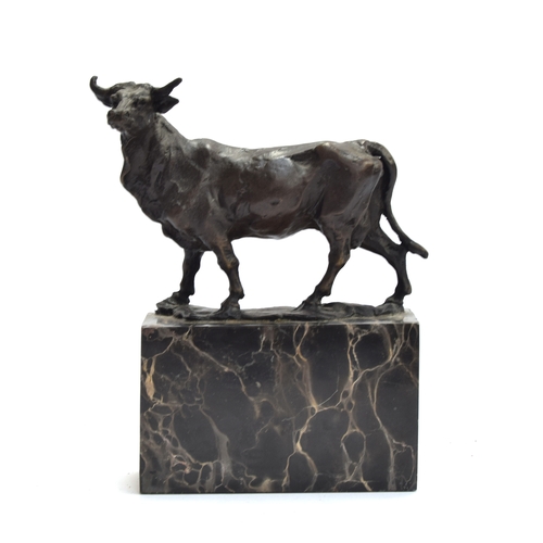 122 - After Louis-Albert Carvin (French, 1875-1951), a bronze sculpture of a cow, signed 'L. CARVIN', on a... 