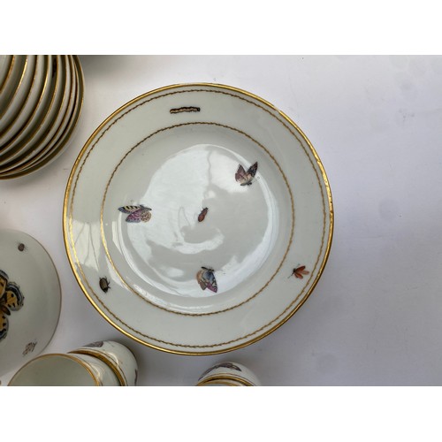 182 - A porcelain Nyon style tea service in decorated with butterflies and insects, teacups (10), coffee c... 