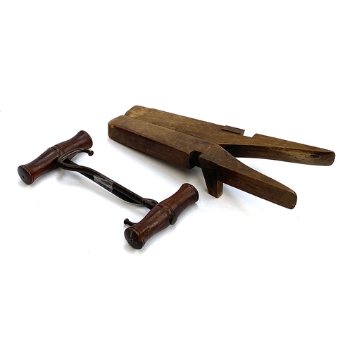 41 - A folding wooden boot jack; together with a pair of boot pulls