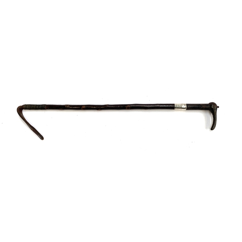 7 - An ash cane hunting whip by Swaine, with silver collar and steel handle, London 1921, 60cmL